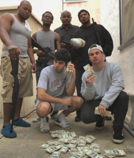 jesse and kyle with men holding gun and money on the floor 